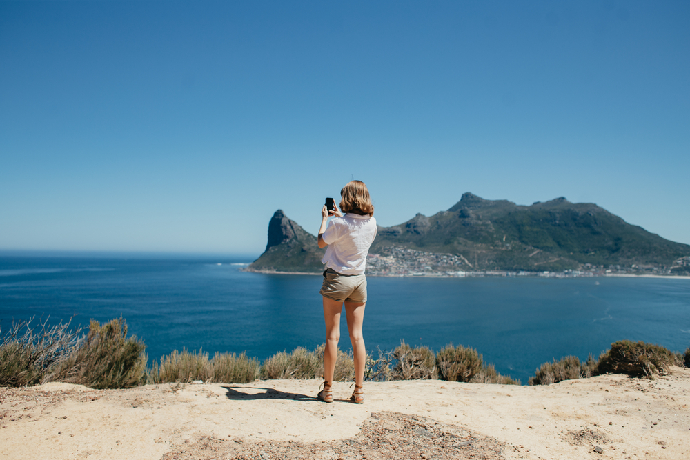 Young woman on a blue sky backdrop