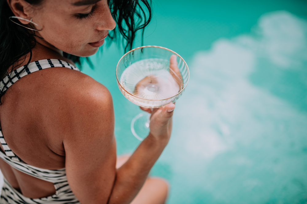 woman holding champagne glass