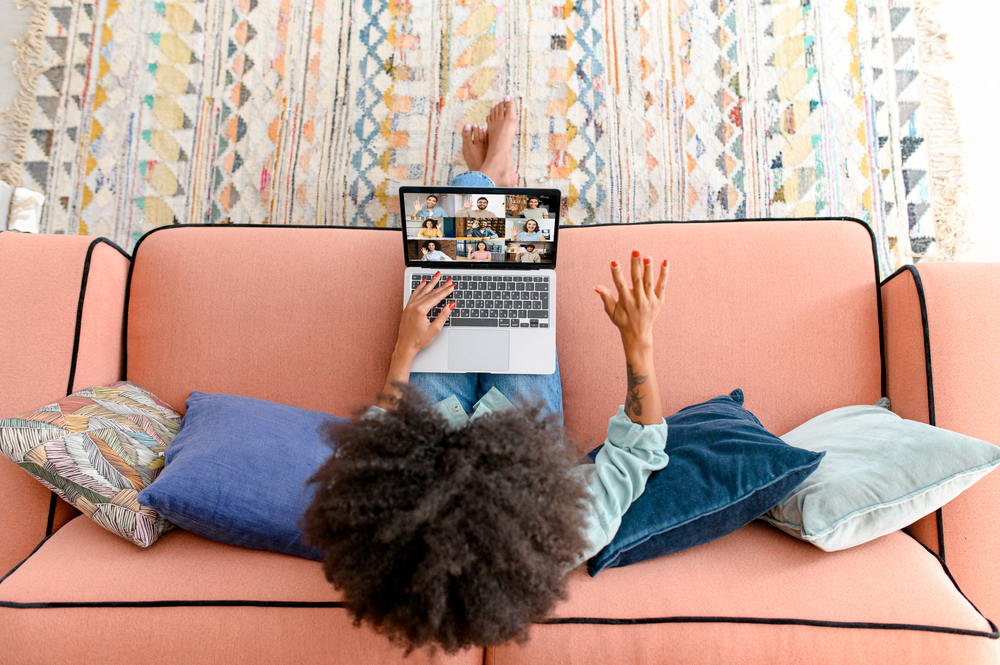 High angle view of female at online meeting