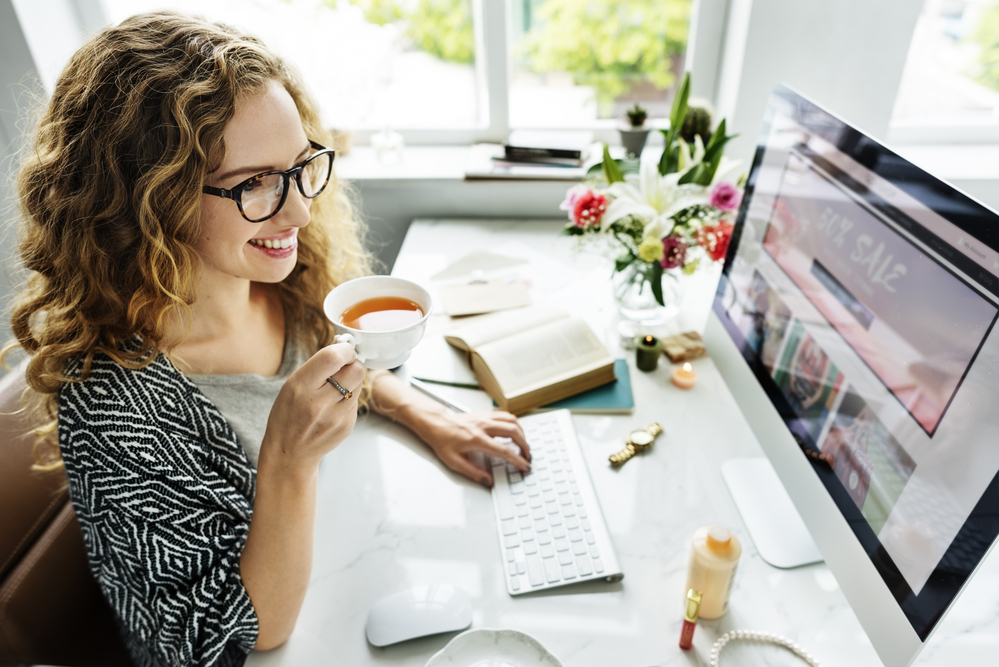 Photo of woman setting up an online store