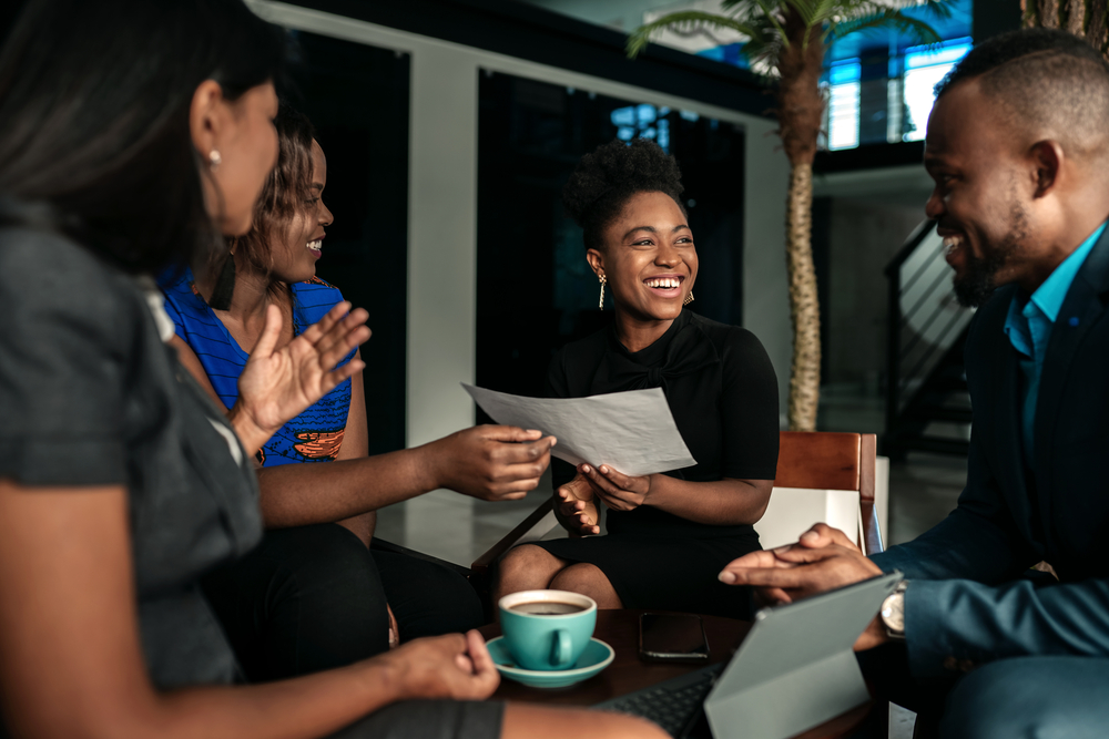 All african casual business meeting. Candid real happy moment be