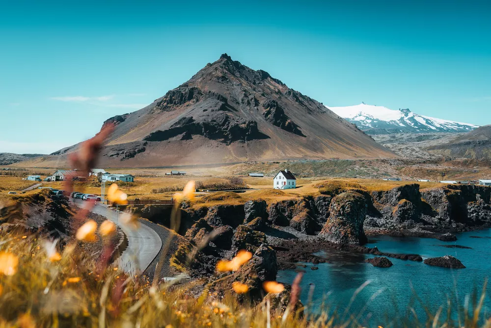 Arnarstapi fishing village with nordic house and stapafell volca